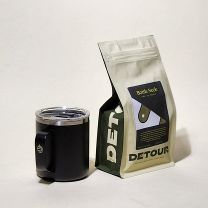 Detour Coffee Roaster Bottleneck Blend - Chocolate, Toffee, Fig Tasting Profile - Filter Balanced Coffee Style - Seasonal Celebration - Consistent Flavor Profile - Smooth Everyday Sipper - Creamy Texture - Approachable Complexity - Baby Raccoon Rescue Inspiration - Learn More on Our Website