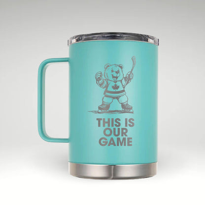 Turquoise insulated mug with an engraved design of a cheerful hockey bear in a Canadian jersey holding a hockey stick, with the text "THIS IS OUR GAME" below. 