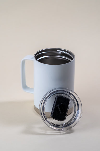 A white insulated coffee mug with a transparent spill-proof lid, featuring a double-wall stainless steel design for long-lasting temperature retention. Ideal for hot coffee, tea, or cold beverages, this BPA-free travel mug ensures a leak-resistant and durable drinking experience for home, office, or travel.
