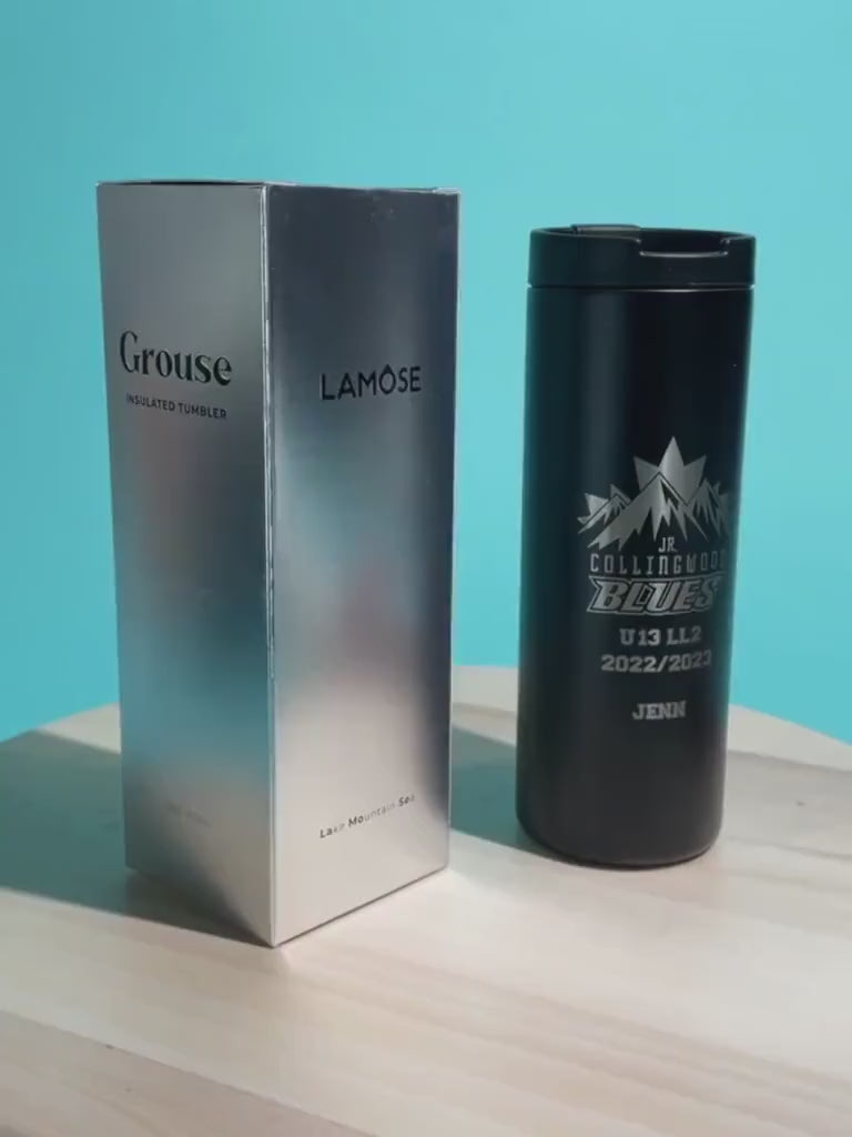 Load video: Black insulated tumbler with a custom engraving. Durable, stylish, and perfect for hot and cold beverages.